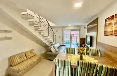 Sobrado em capão novo em condominio proximo ao mar e comercios