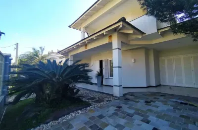 Mansão em capão novo com piscina há 100 metros da praia