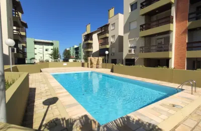 Apartamento em capão novo em condominio proximo ao mar