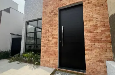 Casa térrea à venda com 3 quartos sendo 1 suíte, 2 vagas de garagem, conceito aberto e jardim lateral, 111m² no condomínio vale azul em votorantim/sp