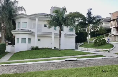 Casa à venda em condomínio no cacupé com 5 dormitórios, sendo 4 suítes por r$ 3,700.000,00!