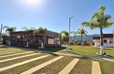 Casa em condomínio fechado com 3 quartos à venda na Avenida Paulo Roberto Vidal, 2490, Caminho Novo, Palhoça