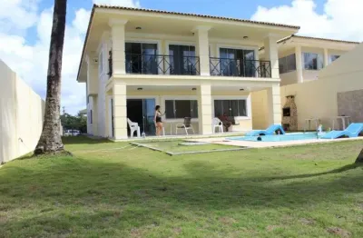 Casa em vilas do atlântico, em frente ao mar com 2 andares. são quartos, sendo 5 suítes