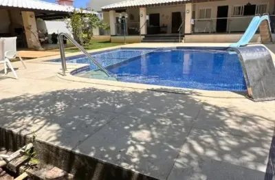 O paraíso exclusivo espera por você: mansão de luxo com fundo para a lagoa e a passos da praia bandeira azul em guarajuba, ba