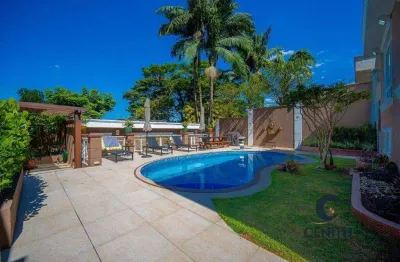 Incrível casa com 4 suítes, 385 m² no coração da granja viana!