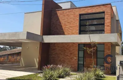 Casa ampla com living integrado, 4 suítes e vista privilegiada, 350 m²
