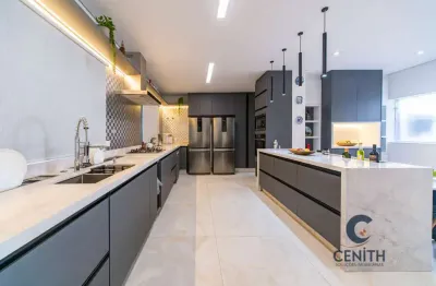 Venda - elegante casa em condomínio são paulo ii, 4 suítes e muito lazer!