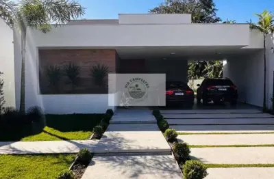 Residência seminova com 285,00 m² construídos, uma suíte e mais dois dormitórios, terreno de 700,00 m², aceita troca