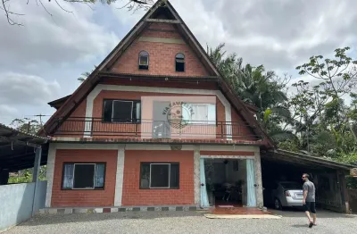 Terreno com 9.292 m2, de frente para o asfalto, estrada timbé, com 2 casas, galpão, rancho