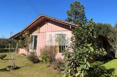 Sítio em campo alegre com 12.100 m², com duas casas de madeira, todo cercado, com riacho nos fundos