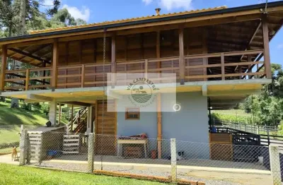 Sítio com 15.000 m², com ampla residencia de 309 m² com 4 quartos, toda cercada, com lago