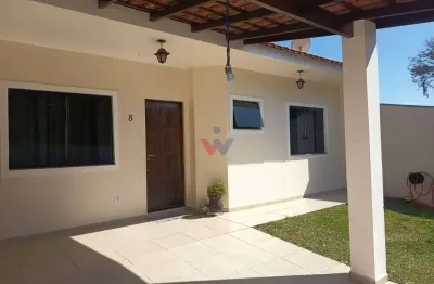 Casa aconchegante em condomínio fechado com 3 quartos, churrasqueira e garagem