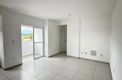 Apartamento a venda de 02 dormitórios com sacada e churrasqueira no bairro barra do aririú em palhoça-sc