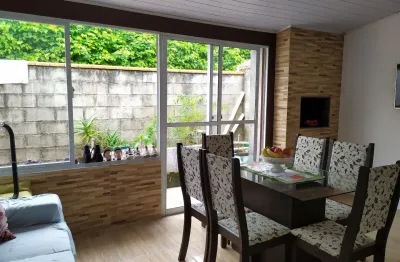 Casa a venda em condomínio fechado de 02 dormitórios com vaga de garagem coberta no bairro bela vista em palhoça-sc