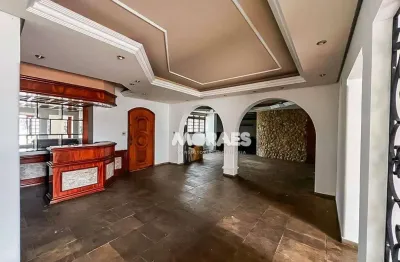 Casa residencial ou comercial com 4 suítes, em frente à USC, 660 m² - venda por R$ 1.800.000 ou aluguel por R$ 14.000/mês - Jardim Brasil - Bauru/SP