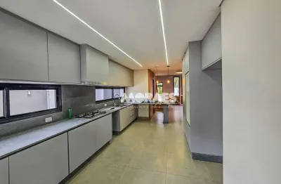 Casa em condomínio fechado com 4 suítes, para alugar, a/c 220 m² por R$ 8.000/mês - Residencial Tivoli - Bauru/SP