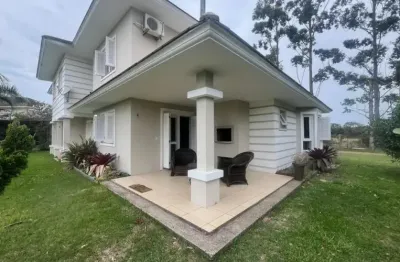 Casa mobiliada no condomínio lake village – palmital, 3 dormitórios, área gourmet e lazer completo!