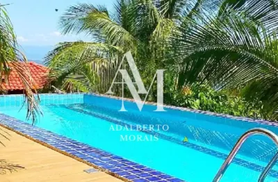 Maravilhosa casa com piscina a  venda ou permuta em condomínio -  ilha bela