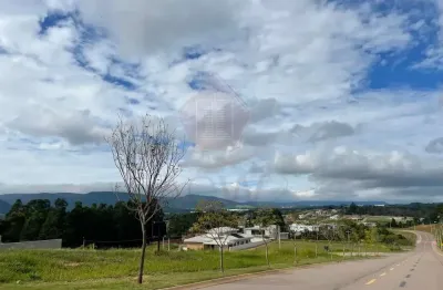 Terreno de 868m² com leve aclive no condomínio terras da alvorada no medeiros