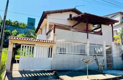 Casa com 6 quartos à venda na rua fábio canabarro, 26, praia de setiba, guarapari por r$ 600.000
