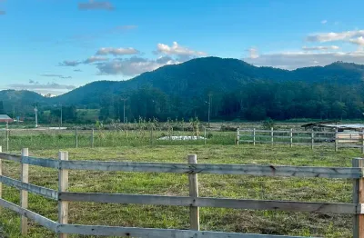 Lote rural a venda em canelinha bairro moura com negociação facilitada