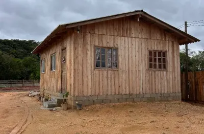 Chácara em canelinha frente para asfalto do moura barbada!!