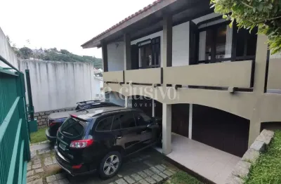Casa com 4 quartos à venda na rua renato ferreira e costa júnior, 170, itaguaçu, florianópolis por r$ 2.500.000