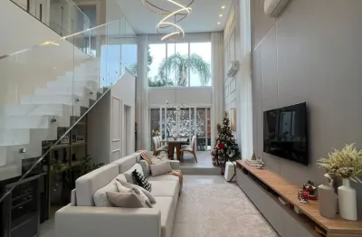 Casa em condomínio fechado  - mobiliada com piscina e 3 suítes a 5 minutos da praia brava – itajaí/sc