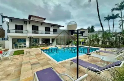 Casa em condomínio fechado com 5 quartos à venda na Rua Ezio Renato João Mora, 151, Jardim Acapulco, Guarujá
