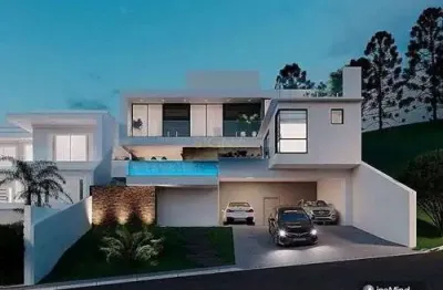 Casa exclusiva de 452m² com piscina de borda infinita e rooftop panorâmico no spinaville ii