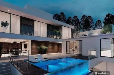 Casa exclusiva de 452m² com piscina de borda infinita e rooftop panorâmico no spinaville ii