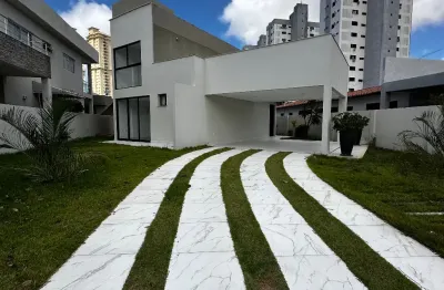 Casa duplex condomínio green woods com 4/ suites uma térrea e 03 na parte de cima , com sala para dois ambientes amplos e área gourmet e cozinha toda integrada com vista para o quintal com divisórias 