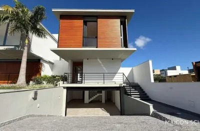 Casa com 4 suítes no loteamento porto da costa- lagoa da conceição- florianópolis/sc