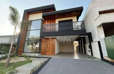 Sobrado com 4 suítes à venda, 208 m² - condomínio parque tauá, araçari - londrina/pr