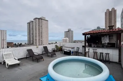 Linda cobertura localizada pertinho da praia com 3 dormitorios 1 suite localizada no bairro mirim praia grande