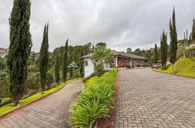 Casa com 6 quartos à venda na baby florense gonçalves, 1723, alto do capivari, campos do jordão por r$ 3.800.000