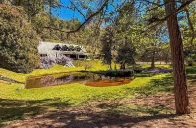 Casa com 6 quartos à venda na avenida pedro paulo, 2110, jardim véu da noiva, campos do jordão por r$ 6.500.000