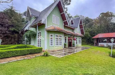 Casa em condomínio fechado com 4 quartos à venda na avenida pedro paulo, 1234, jardim do embaixador, campos do jordão por r$ 1.500.000