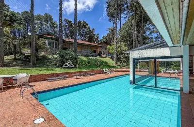 Casa com 6 quartos à venda na rua monte verde, 50, toriba, campos do jordão por r$ 7.800.000