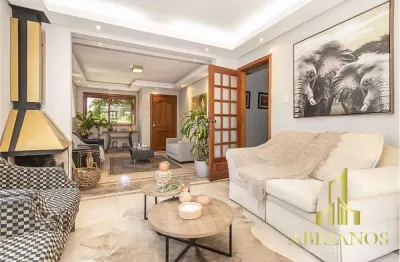 Casa com 4 quartos à venda na rua professor fernando carneiro, 112, três figueiras, porto alegre por r$ 1.500.000