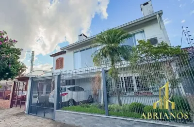Casa com 4 quartos à venda na rua pedro waine, 194, santa maria goretti, porto alegre por r$ 835.000