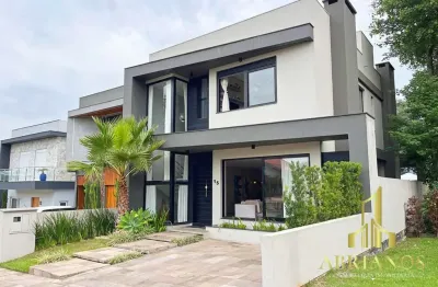 Casa em condomínio fechado com 4 quartos à venda na rua francisco solano borges, 200, hípica, porto alegre por r$ 1.285.000