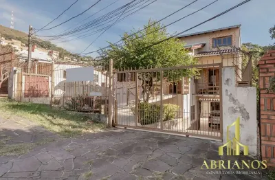 Casa com 5 quartos à venda na rua patrimonio, 119, glória, porto alegre por r$ 731.000