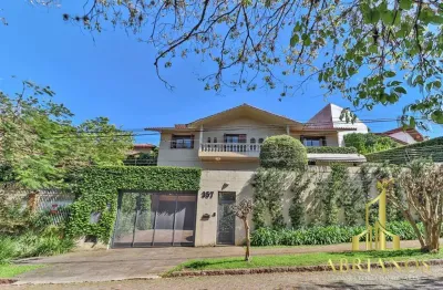 Casa com 4 quartos à venda na rua felipe becker, 357, três figueiras, porto alegre por r$ 2.870.000