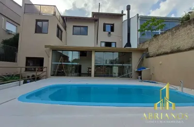 Casa com 3 quartos à venda na Rua Professor Abílio Azambuja, 43, Jardim do Salso, Porto Alegre por R$ 1.299.000