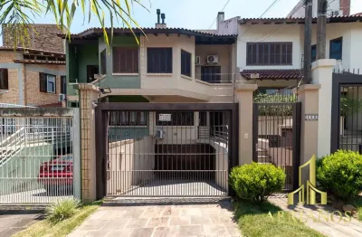 Casa com 4 quartos à venda na Rua General Francisco de Paula Cidade, 486, Chácara das Pedras, Porto Alegre por R$ 1.299.000