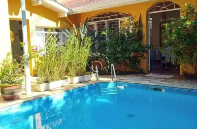 Casa com 5 quartos à venda na avenida pereira passos, 320, vila assunção, porto alegre por r$ 1.600.000