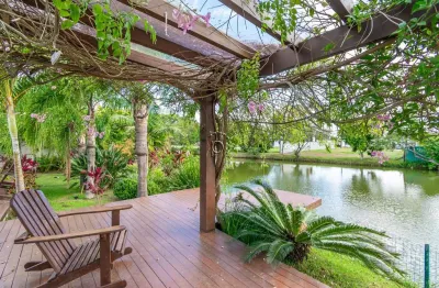 Casa em condomínio fechado com 4 quartos à venda na avenida juca batista, 8000, belém novo, porto alegre por r$ 2.700.000