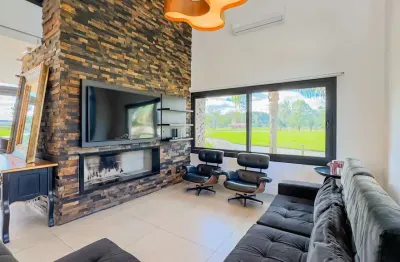 Casa em condomínio fechado com 5 quartos à venda na avenida juca batista, 8000, belém novo, porto alegre por r$ 4.500.000