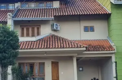 Casa com 3 quartos à venda na avenida juca batista, 1458, ipanema, porto alegre por r$ 749.000